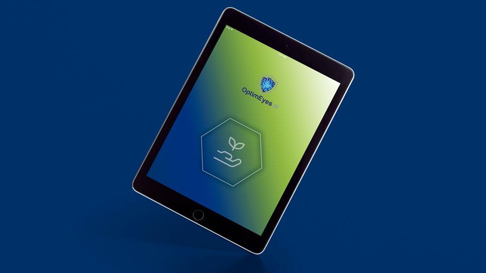 A tablet with OptimEyes logo and ESG Risk Management icon on the screen